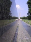 Vietnam_War_Memorial_wall_with_Washington_Monument.jpg